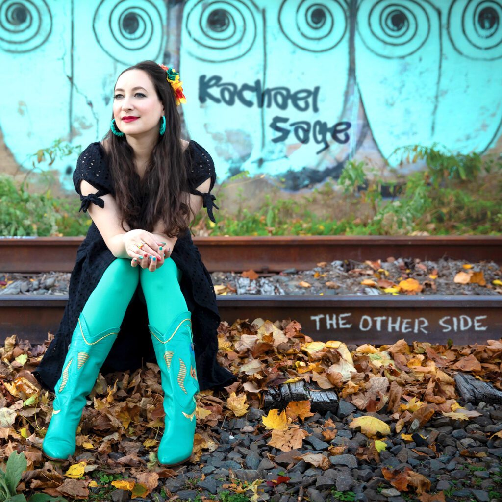 Rachael Sage Releases Electrifying Title Track Video “The Other Side”